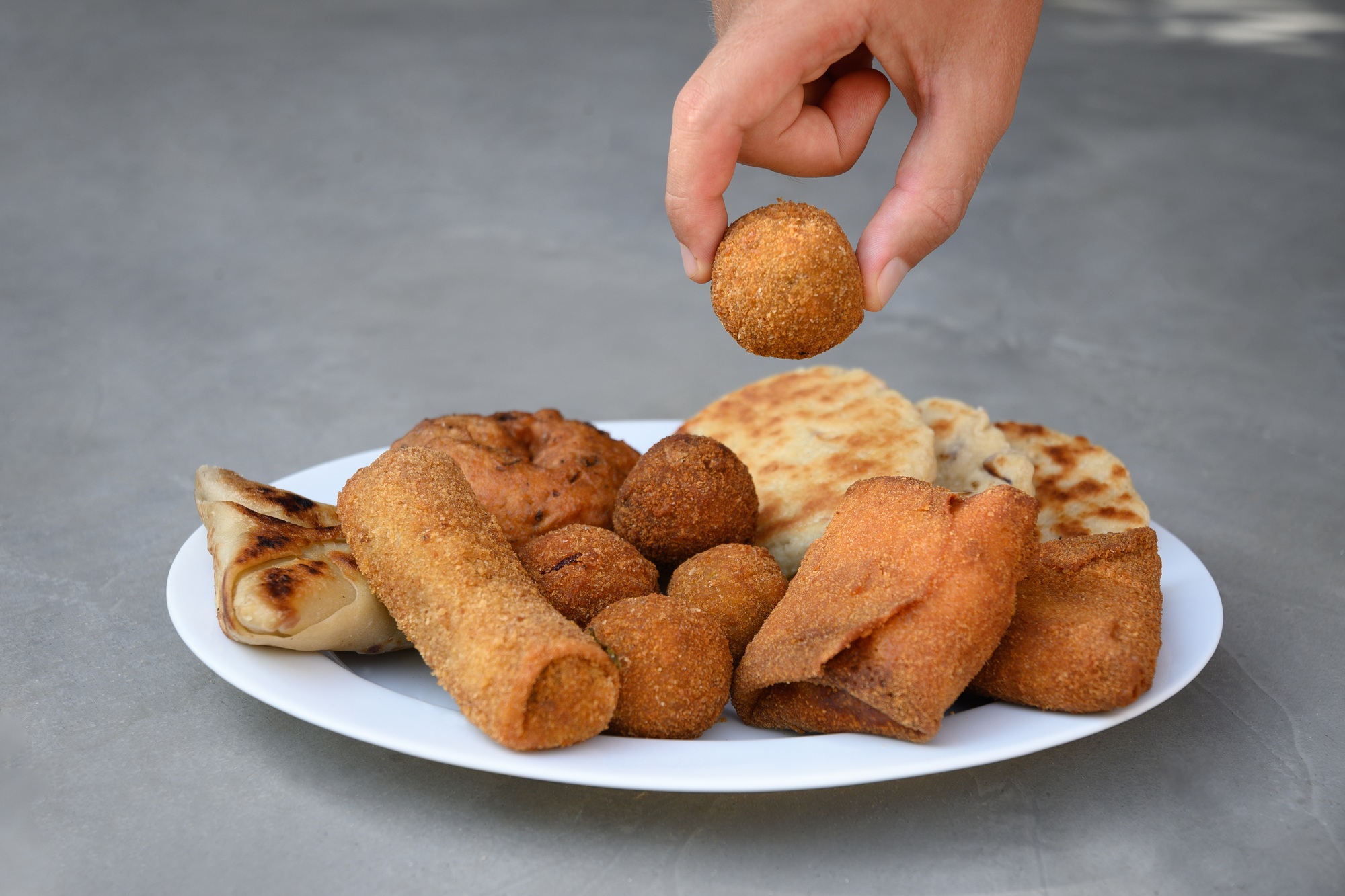 Sri Lankan different street food, vegetable and coconut roti, cutlets, snack.